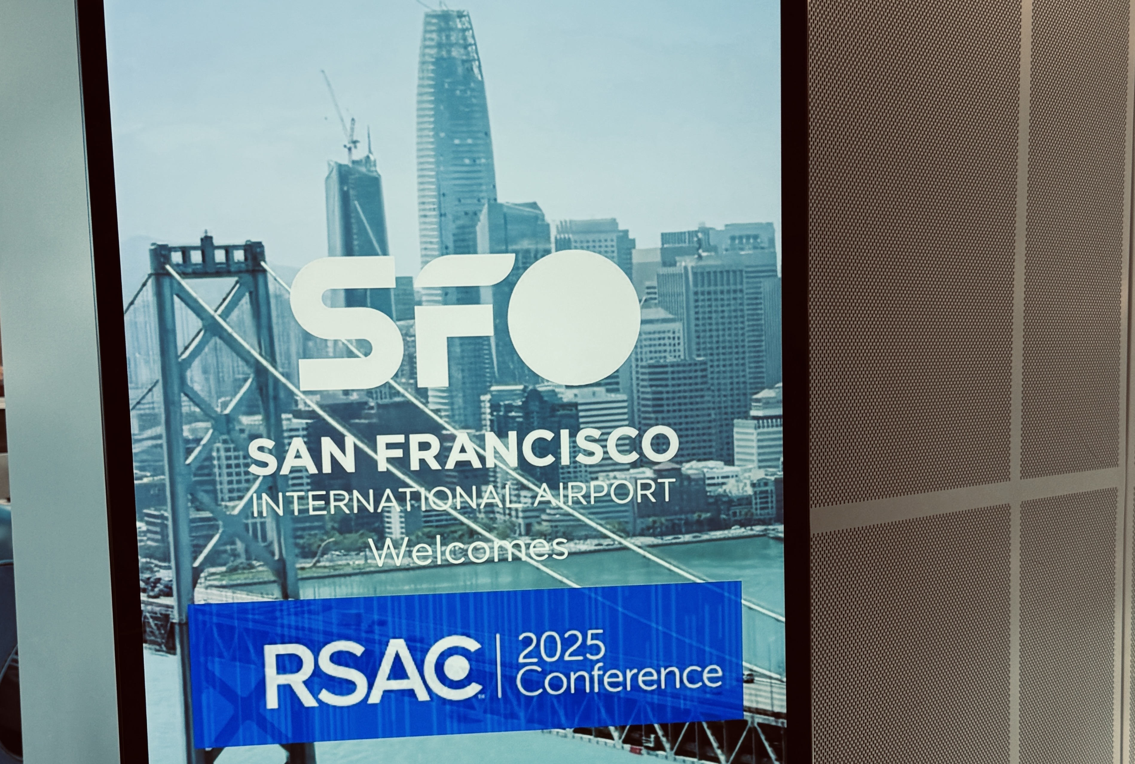 Sign at SFO welcoming visitors to RSAC 2025.