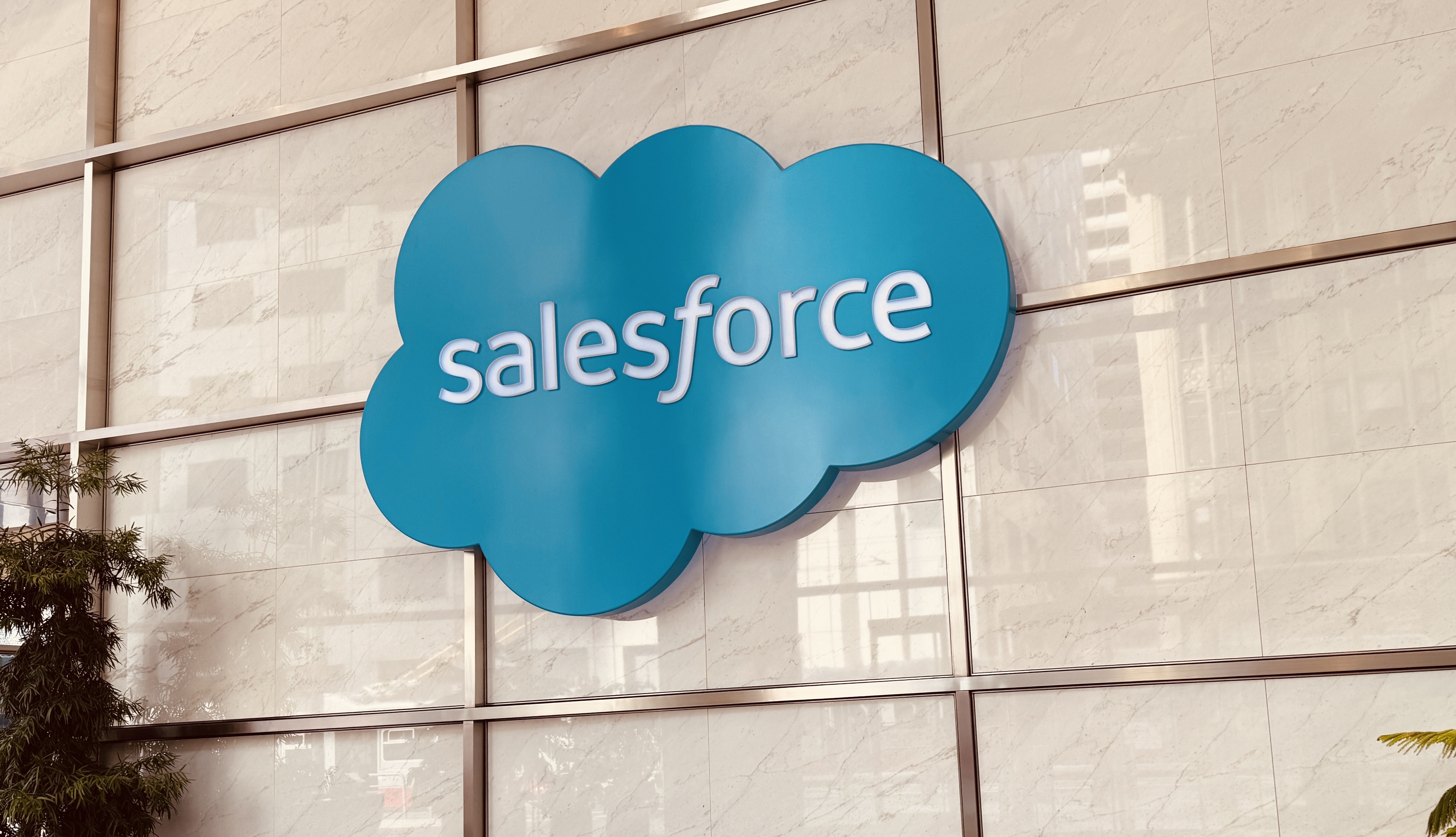 Salesforce logo on the wall of lobby of Salesforce Tower in SF.