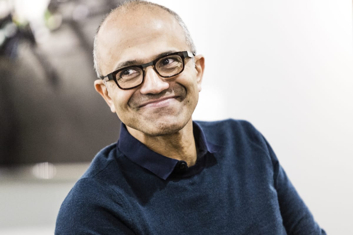 Microsoft CEO Satya Nadella with a slight smile on his face.