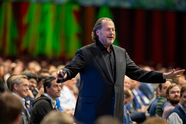 Salesforce CEO Marc Benioff speaking animatedly at Dreamforce 2024.