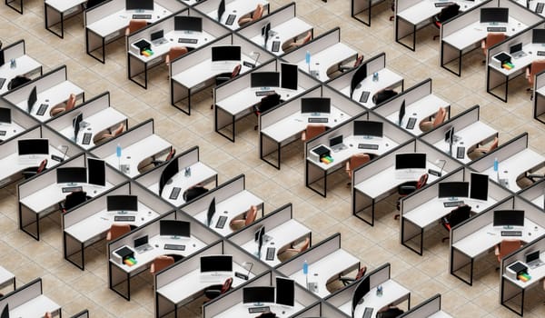 Rows of empty cubicles symbolizing layoffs.